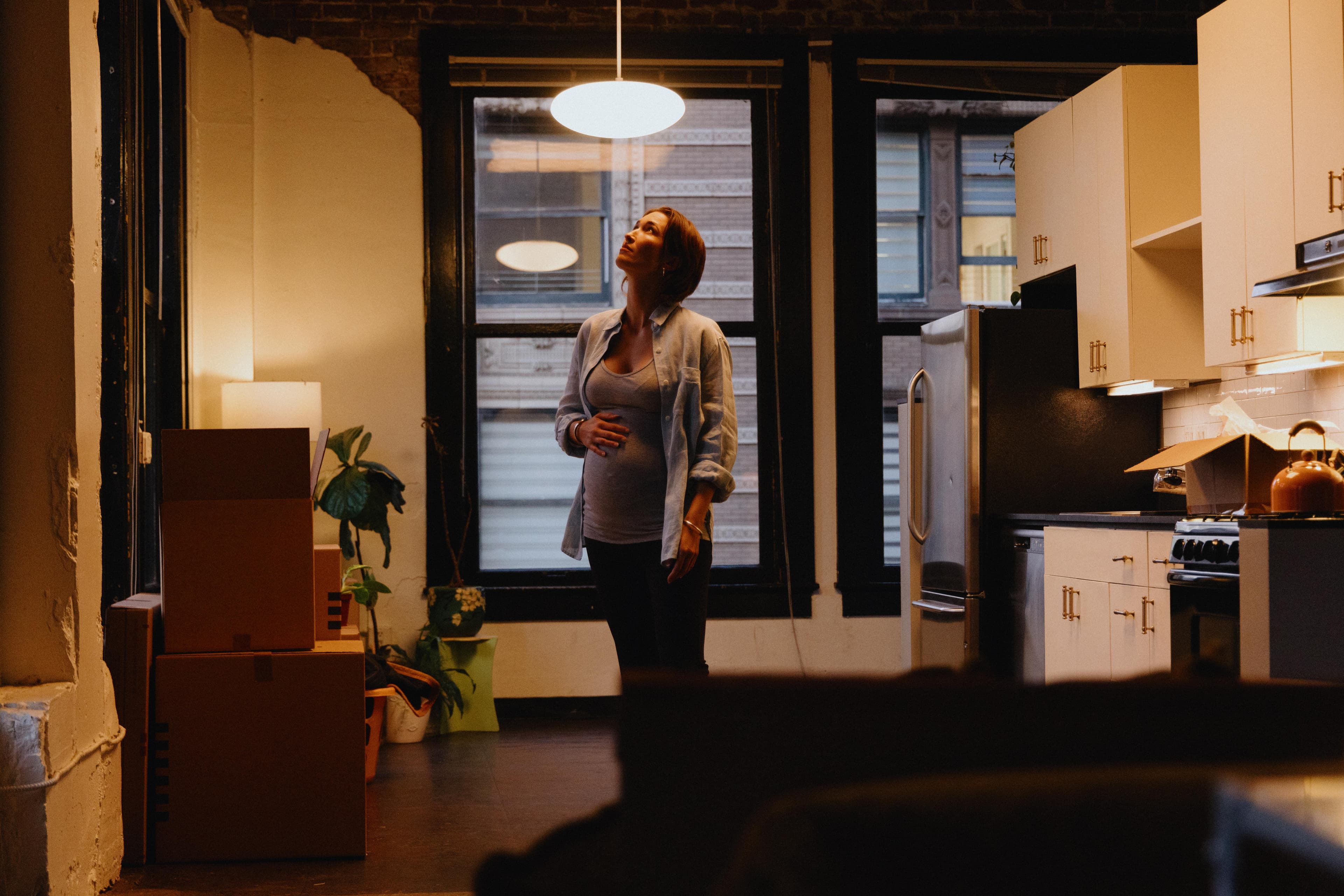 photo of pregnant person in apartment